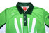 A green golf club shirt with a collar, featuring a logo and bold white graphic design elements.