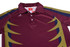 A maroon polo shirt with green and navy design accents. It features a collar and a branded logo.