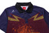 A purple and maroon motorcycle apparel shirt featuring a collar and abstract design elements. It has a logo on the sleeve.