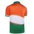 A sporty polo shirt featuring an orange upper with green accents and a white design element on the back.