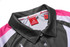 A grey and pink sublimated polo featuring a collar and tag, with a logo visible inside.