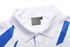 A white polo shirt with blue accents and a collar, featuring a size tag labelled 'M'.