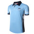A light blue sublimated shirt featuring a navy collar and side panels, with a logo on the front.