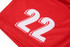 A red volleyball uniform featuring large white number "22" prominently displayed. It includes a logo.