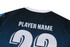 A black and blue volleyball uniform featuring a prominent number 22 and a space for a player name. It has a logo.