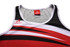 A promotional singlet in red, black, and white with a logo on the upper side.
