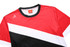 A red, black, and white T-shirt featuring a logo, with a crew neckline and a sporty cut.