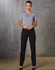 Women's low rise pants in black, paired with a grey top, standing against a textured grey background.