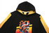 A black and yellow hoodie featuring a colourful abstract graphic on the front and a hood. It has a logo.