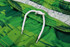 A pair of green shorts featuring a textured design and a white drawstring adjustment.