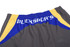 Grey shorts with blue and yellow accents, featuring a branding logo at the waistband.