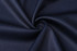 A navy blue fabric with a textured, breathable pattern, arranged in a spiraled fold.