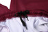 A pair of maroon training pants featuring a black drawstring and a contrasting white inner lining.