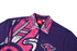 A purple school shirt featuring vibrant pink patterns and a collar with a colourful design. It has a logo on the collar.