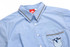 A light blue school shirt featuring a checkered collar and an embroidered logo on the pocket.