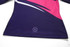 A swimming coat in dark purple and pink, featuring long sleeves and a logo at the bottom.