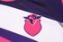 A sports jumper featuring a vibrant design in pink, white, and navy, with an owl logo on the front.