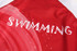 A red swimming suit featuring a graphic design with the word "SWIMMING" displayed prominently.