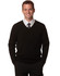 A black men's 100% Merino wool V-neck long sleeve sweater, styled with a shirt and tie.
