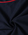 A close-up of a navy blue polo shirt featuring a red accent and a branding logo.