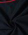 A close-up view of a black polo shirt featuring a red accent and a logo. The fabric appears soft and smooth.
