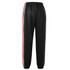Black training pants with red side stripes and an elastic waistband, featuring a logo.