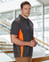 A men's short-sleeve polo shirt in charcoal grey with orange contrast stripes and a logo.