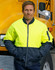 A Hi-Vis two-tone flying jacket in bright yellow and navy, featuring a zipped front and pockets, worn by a man.