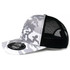 A grey and black camo trucker cap with a mesh back and a branded logo on the front.