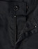 A close-up of black unisex utility stretch cargo work pants, featuring a button and zip closure.