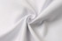A folded white fabric with a smooth texture, featuring a gentle swirl at the centre.