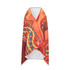 A colourful beach towel with vibrant patterns in red, orange, and blue, featuring a logo on one side.