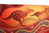 A vibrant beach towel featuring kangaroo designs in red and orange hues, with an intricate patterned border and a logo.