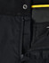 Black work pants featuring a zip and button closure, with a contrasting yellow detail at the waistband.