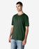 A dark green Gildan Softstyle adult t-shirt on a male model, paired with light blue jeans, featuring a logo.