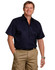 A navy short-sleeved cotton work shirt with two chest pockets, worn by a smiling man.