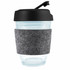 A reusable coffee cup in clear glass with a black flip lid and a gray RPET band. Features a logo.