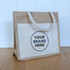 A jute tote bag featuring a natural brown colour with a cream panel and a logo area for branding.