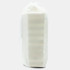 A white pouch containing a stacking puzzle set. The pouch is tied at the top with a drawstring.