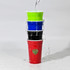 A stack of four double wall party cups in red, black, blue, and green with water pouring over them. Contains a logo.