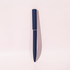 A blue ballpoint pen with a mirror finish, featuring a sleek design and a branding logo.