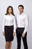 A long sleeve white button-up shirt displayed on a male and female model, both wearing professional attire.