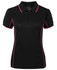 A black polo shirt with pink piping, featuring a collar and a zippered front. Includes a logo on the label.