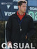 A black unisex adults coaches jacket with a collar, featuring a logo and buttons, worn by a man with a sporty look.