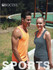 A grey ladies singlet and an orange men's singlet, both featuring a logo, worn by two smiling models outdoors.