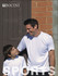 A white sublimation T-shirt, designed for kids, worn by a boy and a man, both smiling against a brick wall.