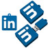 A blue custom USB flash drive shaped like the LinkedIn logo. Includes both the drive and an accompanying logo design.