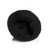 A black bucket hat featuring a wide brim and a smooth inner lining. The hat has a logo.