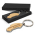 A car-shaped wooden key ring with a metal ring, presented in a sleek black box.