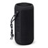 A black cylindrical Bluetooth speaker with textured surface and controls on the side, featuring a decorative strap.